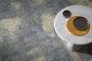 Milliken Comfortable Concrete sherbet lemon duurzaam tapijt